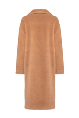 Back view of a camel and silk teddy coat with a loose fit, showcasing its cozy texture and elegant design.
