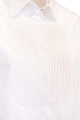 Camicia in cotone bianco con pettorina plissettata, dettagli eleganti e vestibilità regolare.