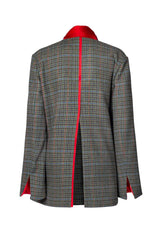 Back view of an over jacket featuring a checkered pattern and a striking red collar, with a high split for ease of movement.