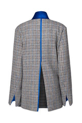 Back view of a stylish double-breasted oversized jacket featuring a high split and contrast blue collar.