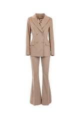 Elegant double-breasted velvet jacket with flared pants in beige, showcasing a refined and stylish look.