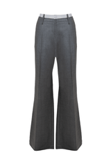 Pantalone ampio in lana grigia con cintura in cotone rigato, elegante e sofisticato per uno stile contemporaneo.