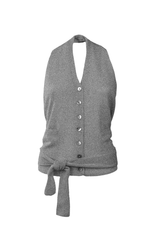 Elegant cashmere gilet with halter neck and tie detail, featuring buttons, perfect for a refined feminine look.