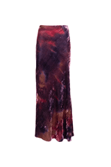 Elegant long velvet skirt with a gradient design featuring deep reds and purples, perfect for a stylish silhouette.