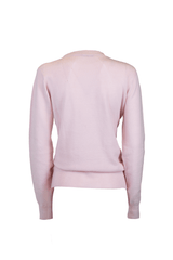 Back view of a soft pink cashmere crew neck sweater, showcasing its elegant design and comfortable fit.