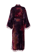 Elegant kimono coat in velvet with a vibrant gradient and decorative tassels, showcasing a sophisticated back view.