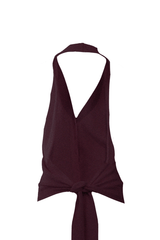 Gilet in fine cashmere with a tied waist and open back, exuding elegance and femininity in deep burgundy color.