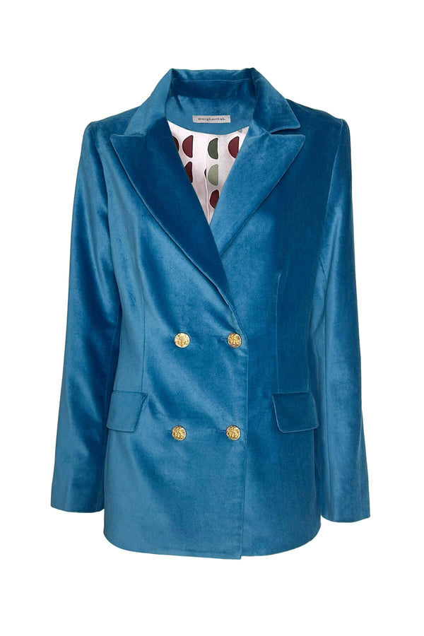 Elegante giacca doppio petto in velluto liscio blu con bottoni dorati, perfetta per occasioni speciali.