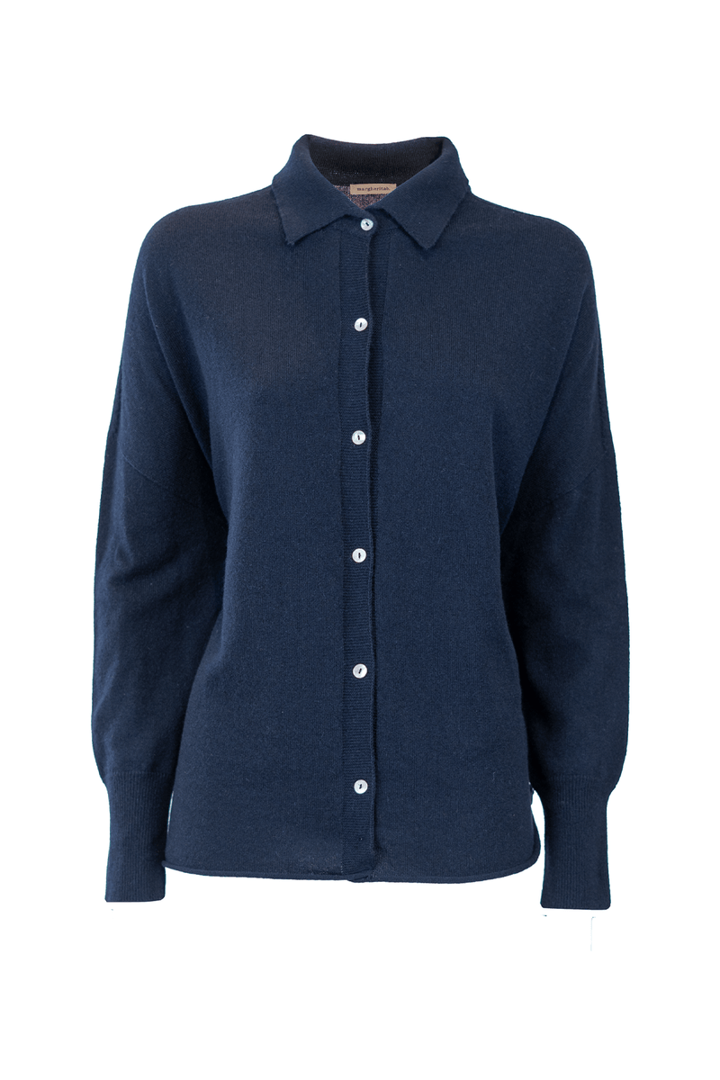 Elegant navy cashmere shirt with button closure and classic collar, perfect for luxurious comfort.