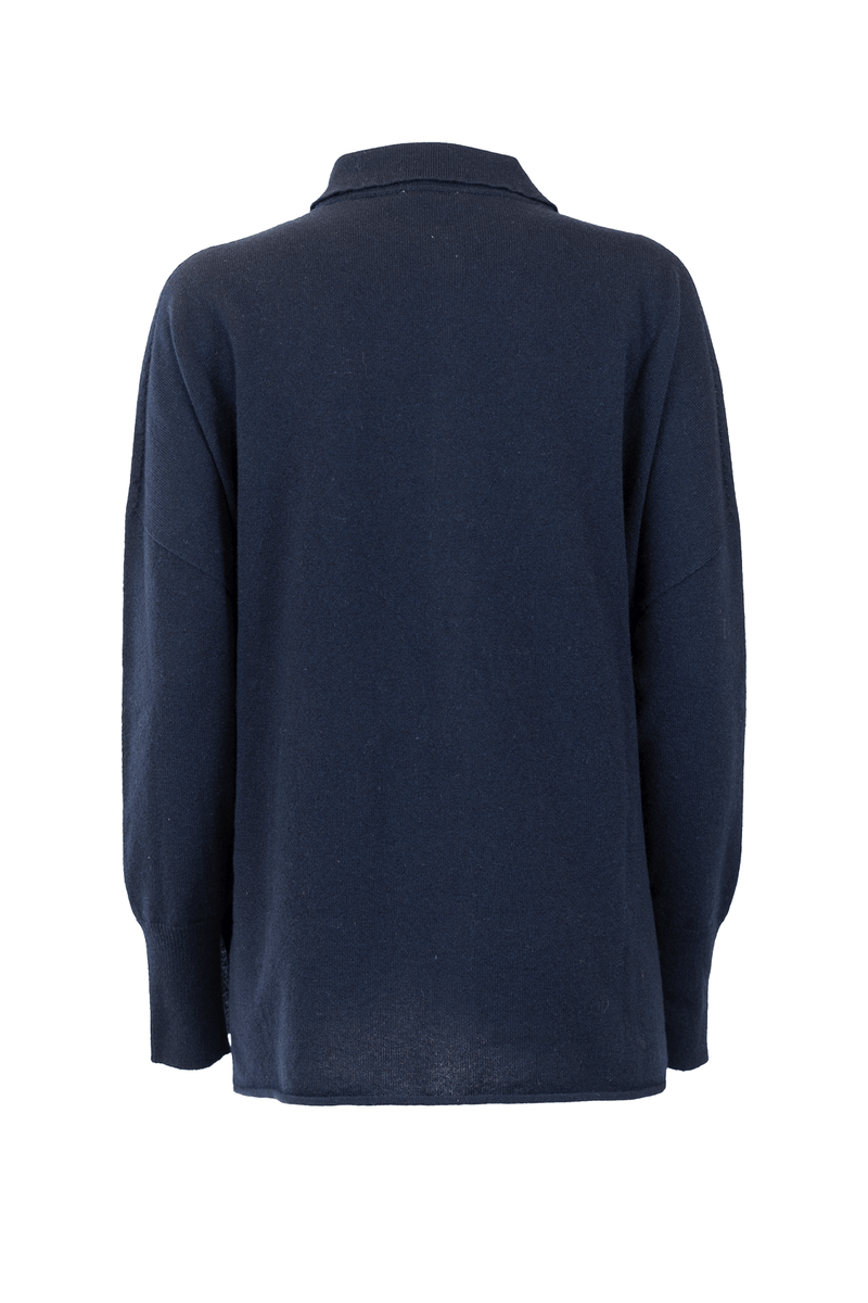 Back view of a navy cashmere shirt, showcasing its soft texture and classic collar design.